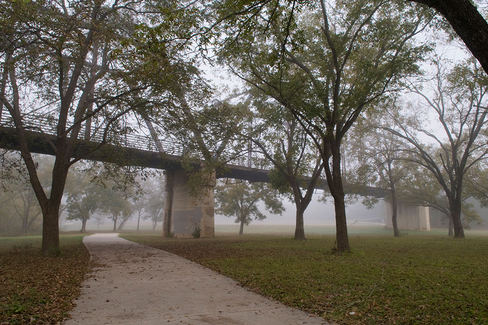 foggy landscape with bridge by rusty ray